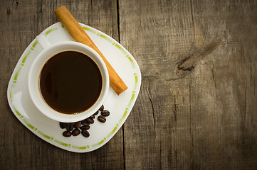 Image showing Coffee Cup with beans and cinnamon stick