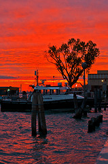 Image showing Venice Italy sunset with cruise boat