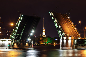 Image showing open drawbridge at night in St. Petersburg