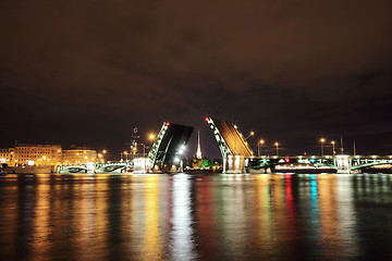 Image showing open drawbridge at night in St. Petersburg