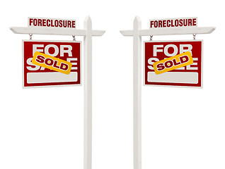 Image showing Two Foreclosure Sold For Sale Real Estate Signs, Clipping Path