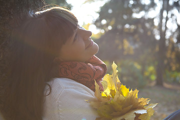 Image showing pretty woman in the autumn park 