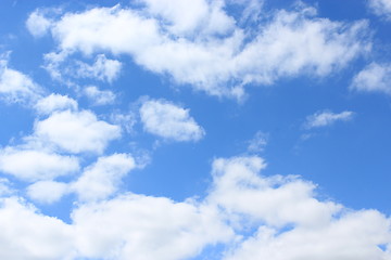 Image showing picturesque white clouds on blue sky background