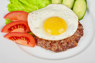 Image showing steak beef meat with fried egg