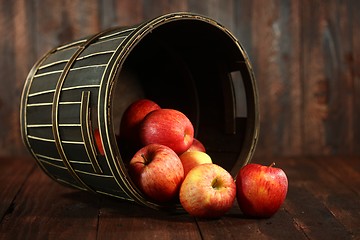 Image showing Barrel Full of Red Apples on Wood Grunge  Background