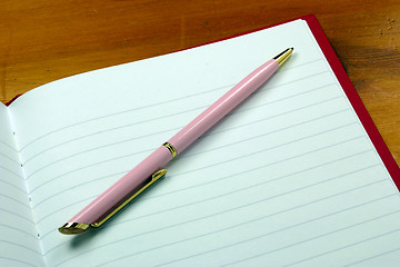 Image showing pen on a notebook