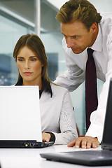 Image showing Business people in an office mm