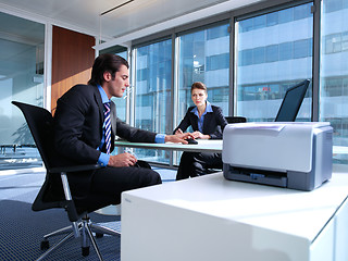 Image showing business couple working at office