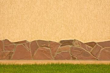 Image showing A wall with a stone border 