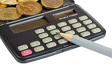 Image showing Calculator, coins and pencil