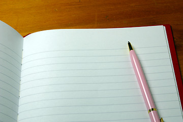 Image showing pen on a notebook
