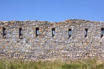 Image showing Ancient broken wall with little windows