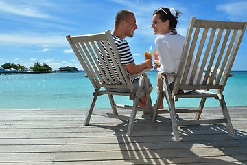 Image showing happy young couple relax and take fresh drink