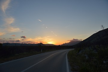 Image showing road through the green field