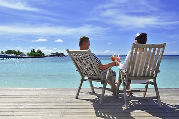 Image showing happy young couple relax and take fresh drink