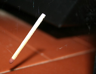 Image showing suspended match