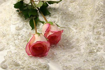 Image showing beaded satin and a roses