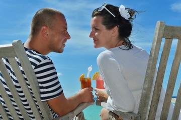 Image showing happy young couple relax and take fresh drink