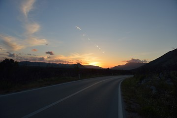 Image showing road through the green field