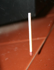 Image showing suspended match