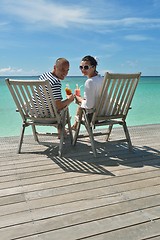 Image showing happy young couple relax and take fresh drink