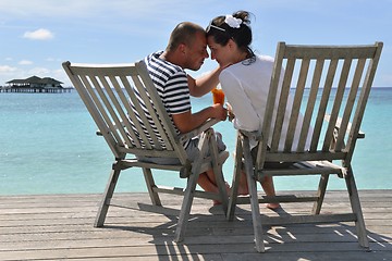 Image showing happy young couple relax and take fresh drink