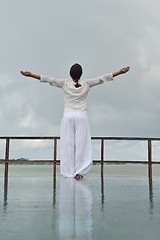 Image showing young woman relax on cloudy summer day