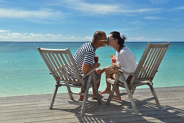 Image showing happy young couple relax and take fresh drink