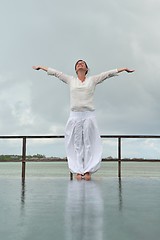 Image showing young woman relax on cloudy summer day