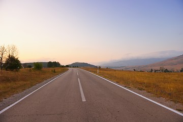 Image showing road through the green field