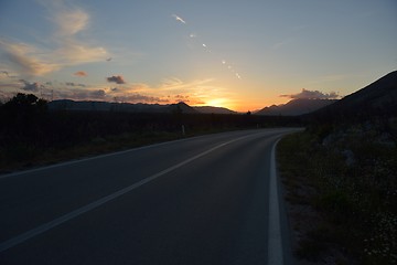 Image showing road through the green field