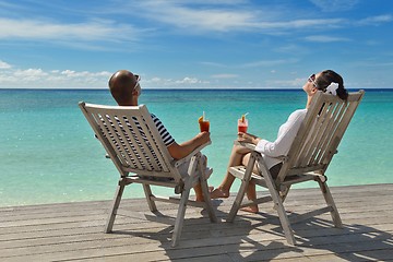 Image showing happy young couple relax and take fresh drink