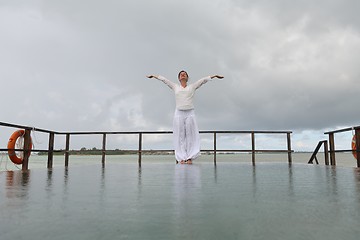 Image showing young woman relax on cloudy summer day