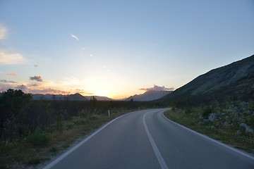 Image showing road through the green field