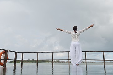 Image showing young woman relax on cloudy summer day