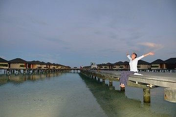 Image showing young woman relax on cloudy summer day