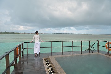 Image showing young woman relax on cloudy summer day