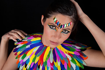 Image showing beautiful woman with colorful extreme makeup and accessoires