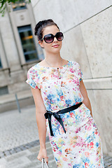 Image showing attractive woman with sunglasses in the city summertime