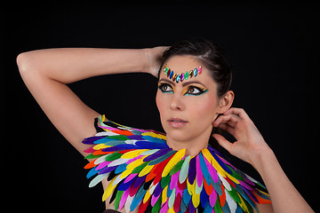 Image showing beautiful woman with colorful extreme makeup and accessoires