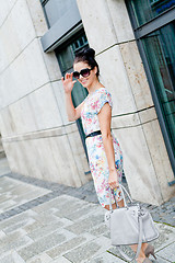 Image showing attractive woman with sunglasses in the city summertime