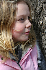 Image showing Girl Against a Tree