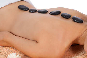 Image showing attractive healthy caucasian woman hot stone massage wellness 