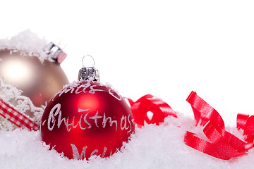 Image showing christmas decoration festive red bauble in snow isolated