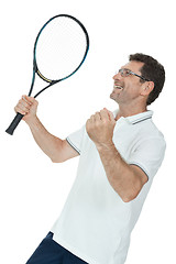 Image showing smiling adult tennis player with racket isolated