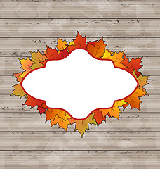 Image showing Autumn emblem with leaves maple, wooden texture