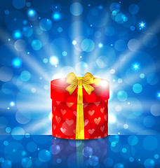 Image showing Round gift box on light background with glow