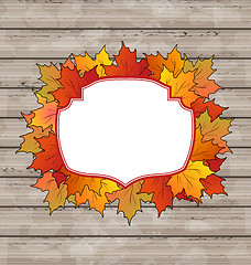 Image showing Autumn label with leaves maple, wooden texture