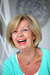 Image showing Laughing vivacious senior woman