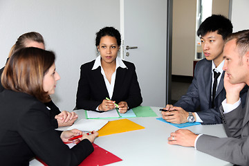 Image showing Group of business people in a meeting